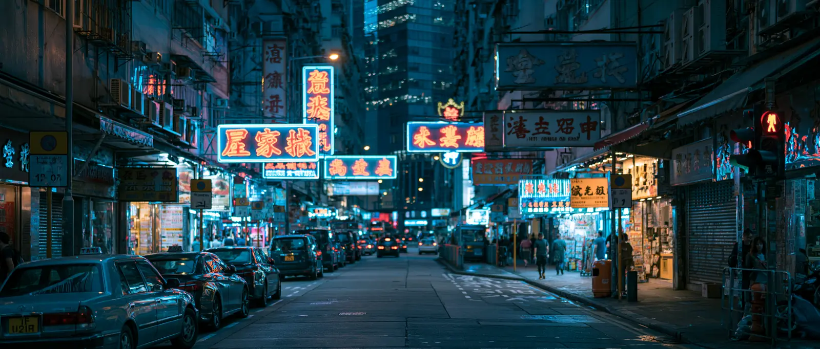 Hong Kong street at night with neon signs